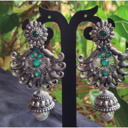 German silver earrings with green crystals and a dangling Pearls